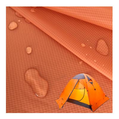 China 100% waterproof nylon silicon coated silnylon nylon tarpaulin fabric ultralight ripstop tent fabric for sale