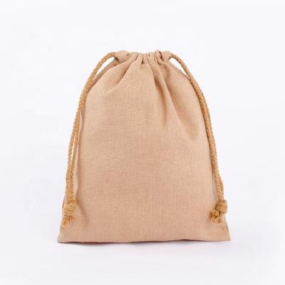 China Gift Wrapping 100% Linen Fabric Natural Light Brown Canvas Small Drawstring Bag For Hanging Packing for sale