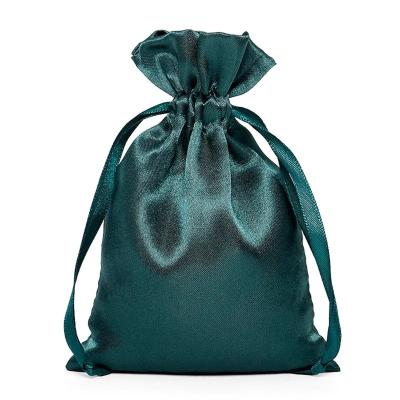 China Gorgeous Hunter Green Silk Fabric Drawstring Gift Bag Small For Bracelet Packaging for sale