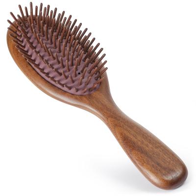 China Customized Beech Wood Bristle Black Walnut Handle Hair Brush Waterproof Oval Wooden Hair Brush for sale