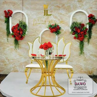 China Modern Modern Stainless Steel Chair Wedding Dining Chair With Flower Shaped PU Antique Back Leather Chair for sale