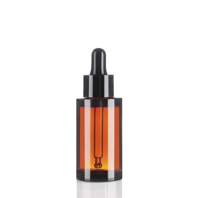 China 30ml Cosmetic Bottles Thick Wall Pet Amber Plastic Bottles With Dropper for sale