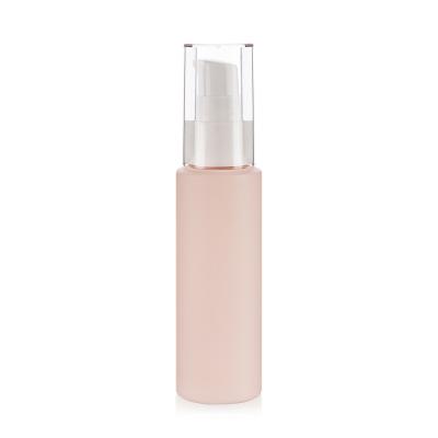 China 60ml 2 Oz Pink Soft Touch Lotion Bottle Matte Finish With Clear Over Cap for sale