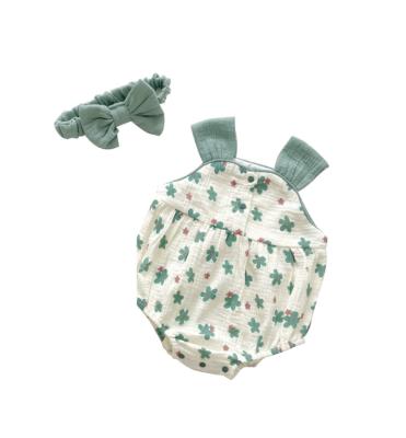 China Cozy Baby Clothes Baby Clothes Sleeveless Summer Jumpsuit Baby 100% Organic Cotton Gauze Romper Hair Tie 2023 Floral Print With Hat for sale