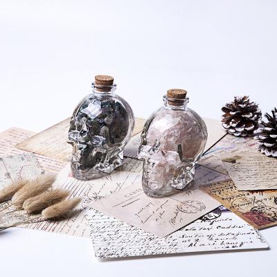 China China Wholesale Glass Bottle Skulls Shape Crystal Chips Stone Wish Bottle For Gift Decoration for sale