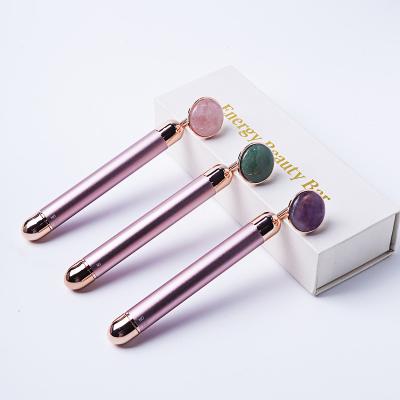 China China Rose Pink Crystal Electric Healing Natural Wholesale Crystal Eye Facial Massage Stick for sale