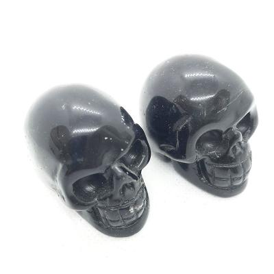 China China high quality hand carved natural obsidian skulls crystal artware for sale