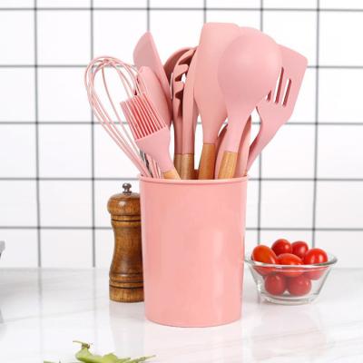 China Sustainable Kitchen Accessories Cookware Tools Silicone Nonstick Kitchen Utensil Set With Wooden Handle for sale