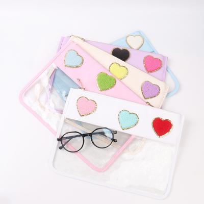 China Fashion Simple Design Custom Logo Clear Toiletry Bag Personalized DIY Patches Makeup Cosmetic Bag For Travel for sale