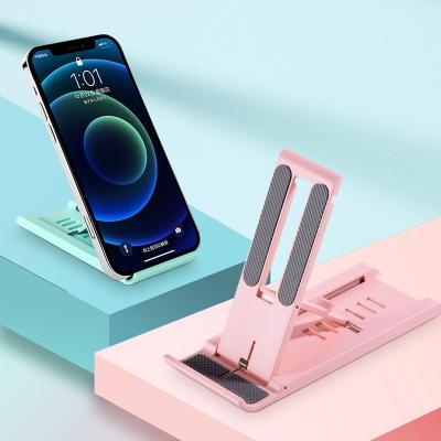 China Foldable Universal Adjustable Plastic Cell Phone Lazy Stand Holder Phone Mobile Phone Tablet Stand Holder for sale