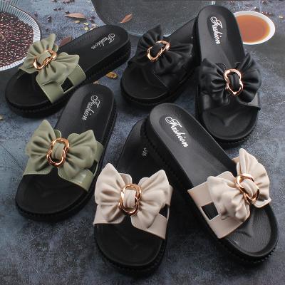 China Fashion sandals summer new women's slippers factory direct supply durable outdoor casual thick bottom rosette slipper thick-soled slippe for sale