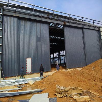 China Modern Steel Sliding Electric Sliding Warehouse Door / Aircraft Airship Hangar Large Doors for sale