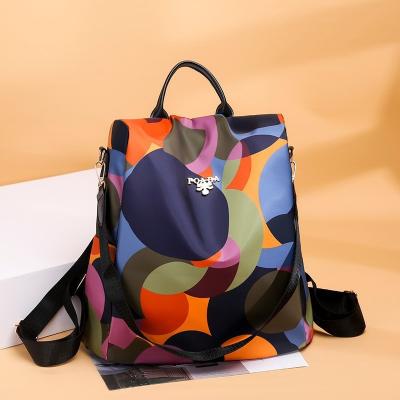 China Portable large capacity nylon waterproof anti theft multi function double shoulder backpack women's solid color bags for sale