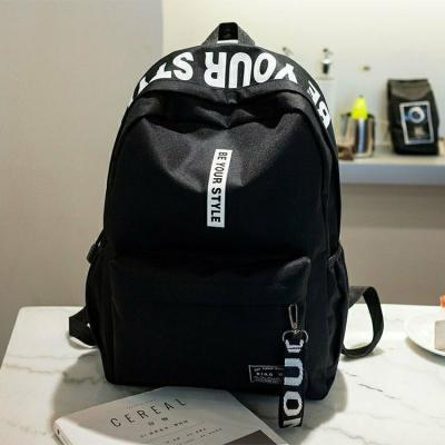 China Portable high school student bag large capacity canvas letter backpack men women's outdoor travel backpack for sale