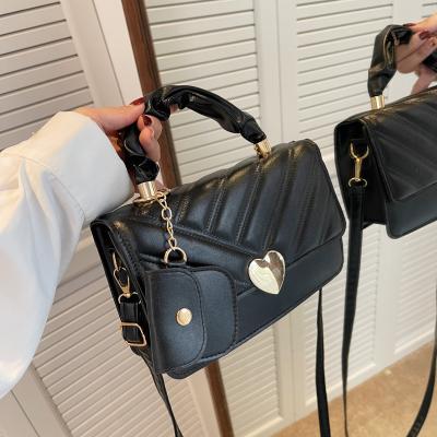 China Fashion women texture small handbag 2022 new retro fashion portable shoulder messenger bags for sale