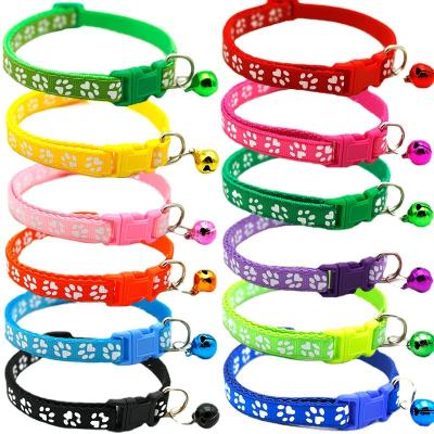 China 2022 Viable Wholesale Multi Colors Paw Print Adjustable Nylon Pet Cat Dog Collar with Bell for sale