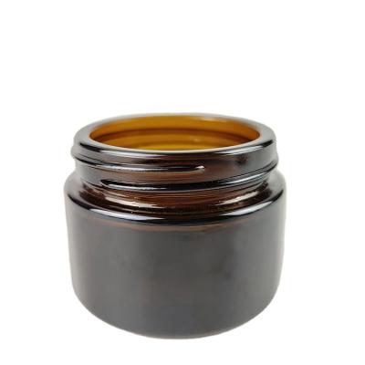 China 30g 50g 60g 100g Amber Blue Green Clear Round Cosmetic Shape Glass Cosmetics Cream Jar Glass Candle Jars for sale