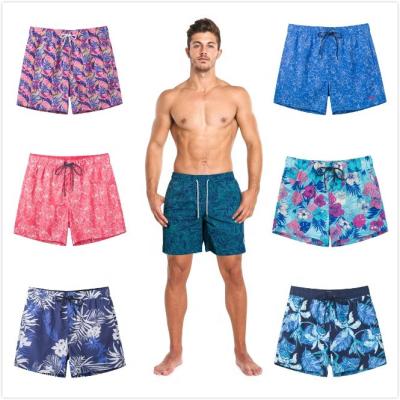 China Custom Anti-Wrinkle Mens Printing Leaves Mens Beach Shorts Mens Swim Trunks Shorts Swimwear With 100% Polyester Fabric Dry Quickly for sale