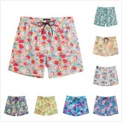 China OEM Breathable Print Summer Custom Made Designer Beach Wear Colorful Flowers And Leaves Swim Shorts For Men for sale