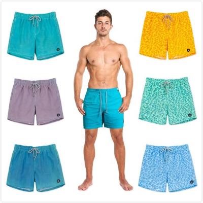 China Newest Fashion Breathable Custom Discoloration By Water Or Heat Changing Color Mens Swim Trunks Swim Shorts Mens for sale