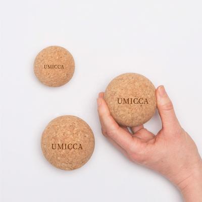 China Anti-Shatter All Natural Cork Massage Balls Natural Firm Ultralight Eco-Friendly Fascia Customized Logo Yoga Massage Ball With Travel Bag for sale