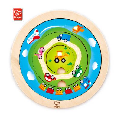 China Two difficulty levels and two distinct games. Hape Carrying Jigsaw Puzzle Baby Wooden Rotating Educational Game for sale