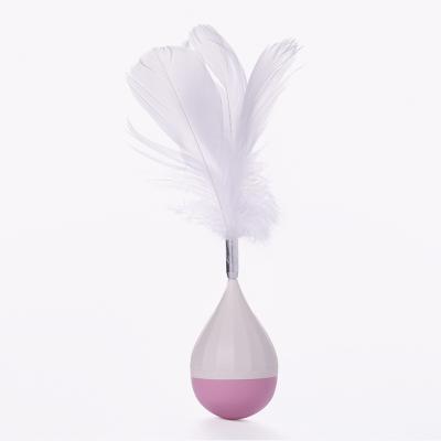 China Viable New Arrival Self Fun Cat Stick Educational Pet Cat Toys Durable Rocker Cat Toy Ball With Feather for sale