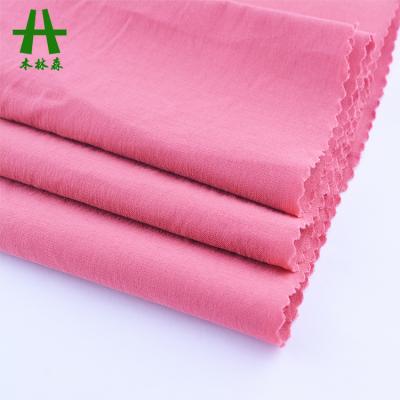 China Mulinsen Textile Plain Dye Rayon Nylon Stretch Toko Bengaline Fabric For Man Pants for sale