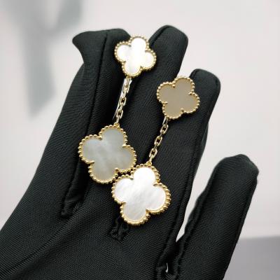 China Van Cleef Arpels Magic Alhambra earrings, 2 motifs 18K yellow gold, Mother-of-pearl for sale