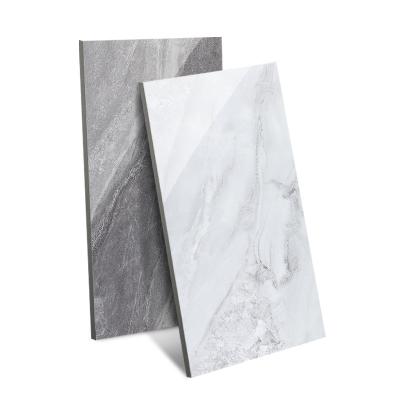 China Modern Hot Selling Large 600x1200mm Porcelain Tile New Living Room Full Body Glossy Light Color Ceramic Marble Luxurious Gray Room for sale