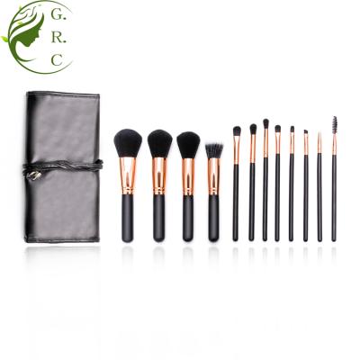 Chine Angular Blush 12pcs Makeup Brush Set Black Wooden Handle Rose Gold Makeup Brush Set Cosmetic Bag à vendre