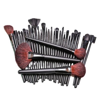 China Angular Blush Custom Logo Luxury New Goat Hair Black Cosmetic Brush Top Quality Wooden Handle Make Up Brush 32pcs Makeup Set Brush Te koop