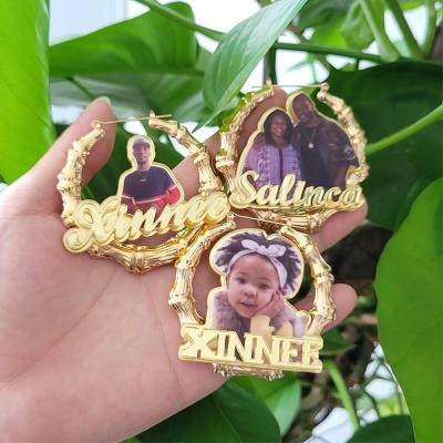 China Custom Hiphop Baby Photo Cartoon Character Acrylic Perforation Earrings Personalized Name Circle Bamboo Earrings For Women Girls for sale