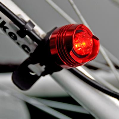 China Aluminum Alloy+Silicone Button Cell Silicone Led Ruby Bicycle Tail Warning Rear Bike Light waterproof safty light for sale