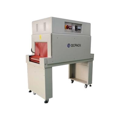 China Small CLOTHING Cardboard Shrink Wrap Heat Tunnel Packing Machine for sale