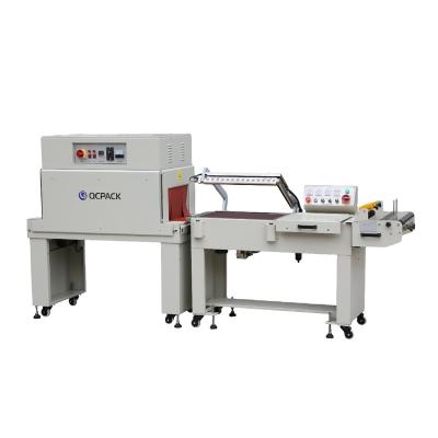 China Semi Automatic CLOTHING Small Juice Carton Box Shrink Wrapping Machine for sale