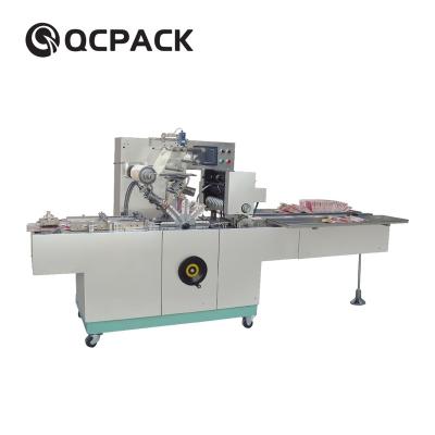 China Automatic Clothing Folding Film Perfume Box Cellophane Wrapping Machine for sale