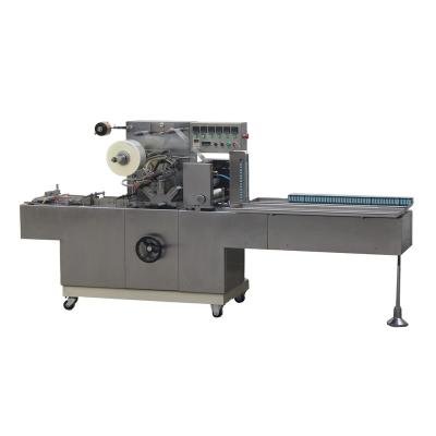 China Economical Efficient CLOTHING Toffee Processes Cellophane Wrapping Machine for sale