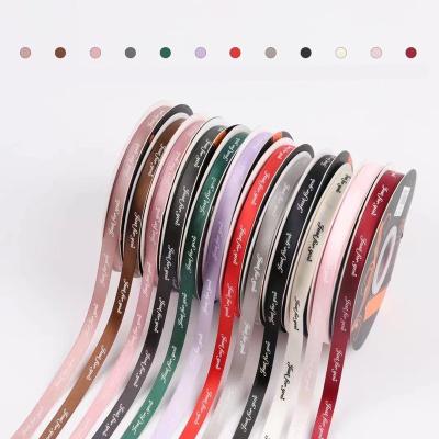 China Beautiful Pengfa Wholesale 1cm Solid Color Valentine Gift Packing Satin Ribbons Ribbons with Print Logo Just For You for sale