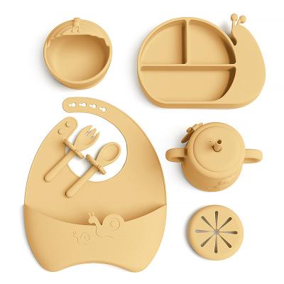 China BPA Free Factory New Design Baby Silicone Dinnerware Set Child Snail Food Feeding Dish Bowl Divided Cup and Bib for sale