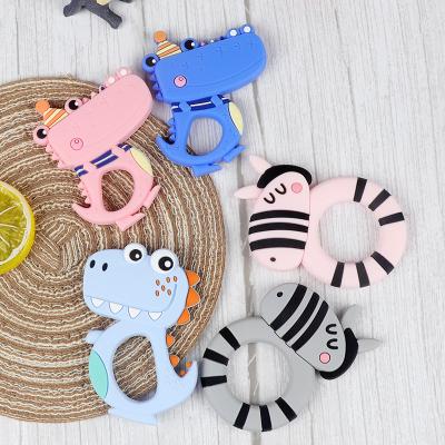 China Free Custom Safe Animal Dinosaur Teethers Soft Teethers Baby Teether Pacifier Teething Teether Bpa Baby Toy Food Grade Silicone Animal Dinosaur Teethers for sale