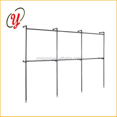 China Reinforced Wall Mounted Garment Wall Display Rack Clothing Display Fixutre For Socks Shirts for sale