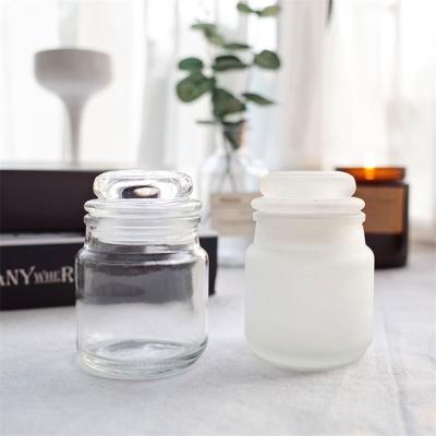 China Home Decoration Hot-selling Spray Discrimination Matte Ceramic Jars With Lids Empty Embossed Wide Mouth Candle Jar for sale