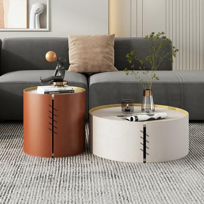 China Stone Coffee Modern Round Side Table Tea Table Clumped Simple Leather Coffee Table Saddle Leather Coffee Table for sale