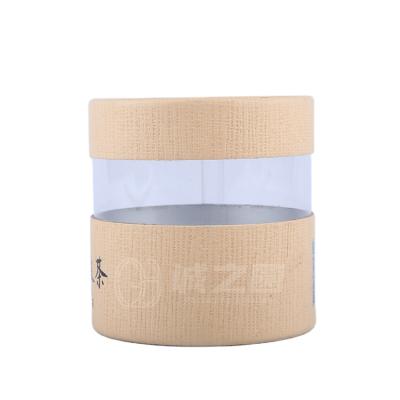 China Biodegradable Kraft Paper Tube Packaging With PVC CustomCMYK Printed Round Jar Packaging Box For Tea for sale