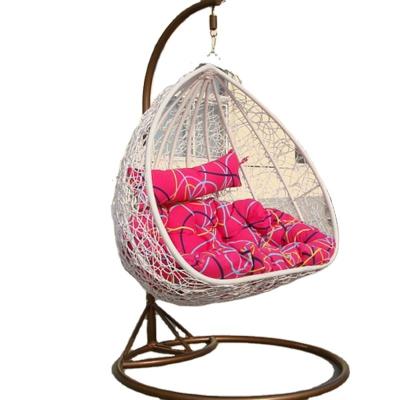 China Modern Outdoor Rattan Double Seat Wicker Egg Swing Hanging Chair With Metal Stand for sale