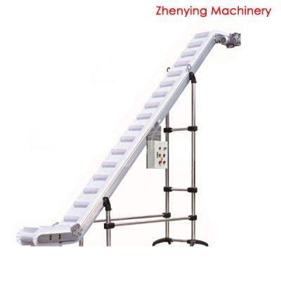 China Heat Resistant Rubber Belt Peanut Vertical Lifting Conveyor for sale