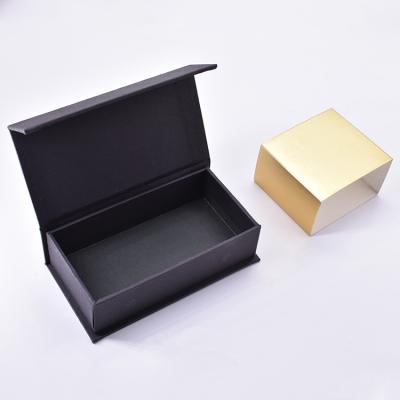 China Recycled Materials Custom Black Cardboard Magnet Recycled Gift Boxes With Gold Sleeve for sale