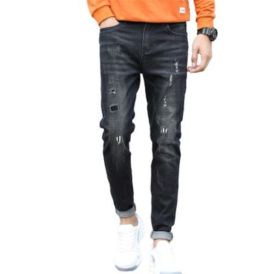 China Autumn new breathable trend ripped patch color men's jeans young boys denim casual long pants YC1822 for sale