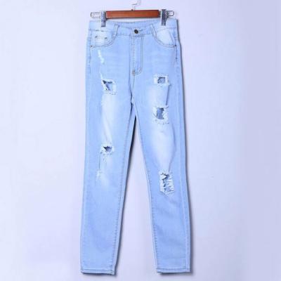 China Hot Selling Breathable New Pant Hole Female Jeans Ripped Pants Slim Ladies European American Size for sale